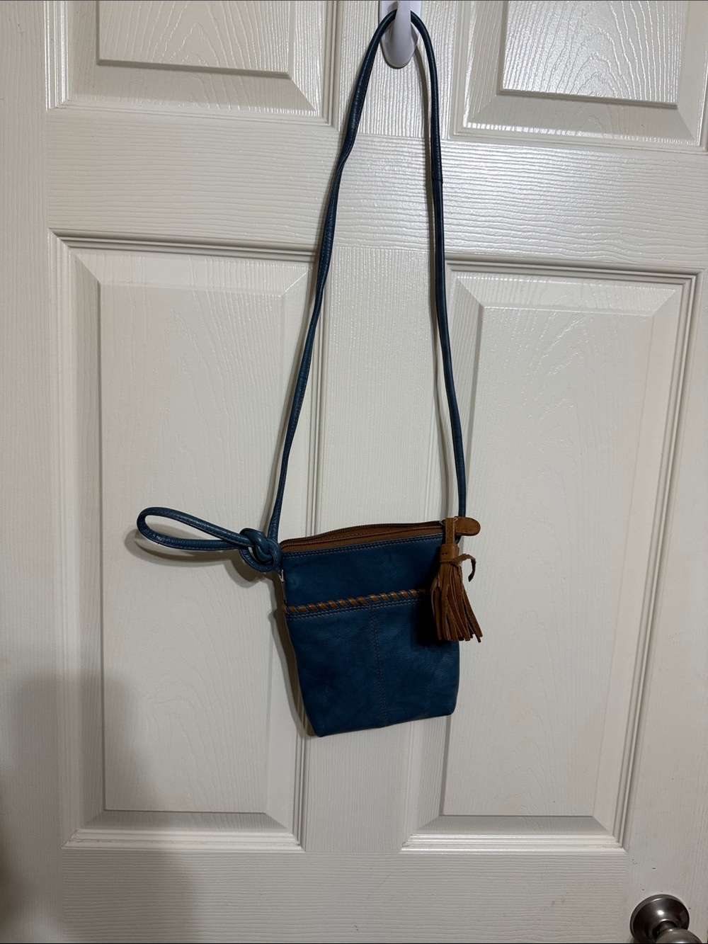 ili New York Teal Blue Crossbody Bag with Brown Tassel Accent